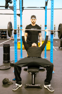 Arsenal Health HYROX training bench press Denver